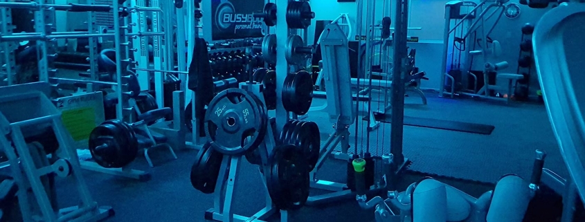 Photo of Busy Body gym with blue fluorescent lights